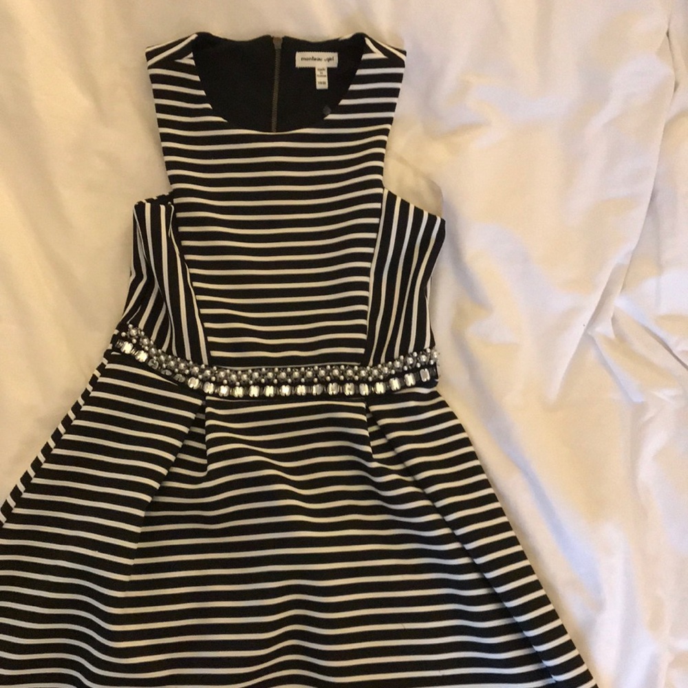 Black and white striped dress with jewel belt.
